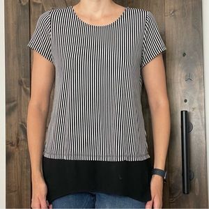 Black and white comfortable blouse. Dress it up or keep it casual.